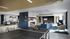 games tables, lounge seating and televions, located in clubhouse