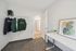 private bedroom desk and clothing rack