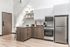 Modern kitchen showcasing sleek cabinetry, stainless steel appliances, and minimalist decor.
