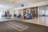 Inviting lobby of Bridgeport House featuring modern seating, a welcoming ping pong area, and sleek contemporary decor for relaxation and socialization.