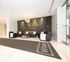 Elegant apartment lobby with contemporary leather seating, chic lighting, and a stylish map mural feature wall.