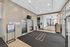 Elegant Preston House lobby featuring sleek elevators, modern design, and inviting atmosphere.