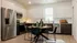 Modern kitchen at RailRunner townhomes with stainless steel appliances, clean cabinetry, and open layout.