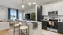 apartment unit in Kenosha with kitchen island and spacious living room