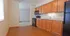 Charming modern kitchen with wooden cabinets, sleek appliances, and granite countertops.