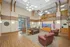Charming lobby featuring plush seating and a vibrant fishtank