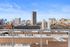 Captivating cityscape view featuring a dynamic skyline with modern high-rises and vibrant architecture.