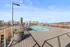 Luxurious rooftop pool with stunning city skyline views, perfect for relaxation and leisure.