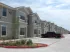 Exterior Apartment Buildings with Parked Truck View - La Joya Apartments in Laredo Texas