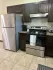 La Joya Apartments Interior Kitchen Room with Stove and Fridge View