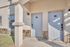 Charming apartment entrance with elegant beige doors, modern design, and welcoming atmosphere.
