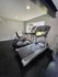 Close-up of Life Fitness treadmill and elliptical in the cardio area of the Trailwood Village Apartments fitness center in Kingwood, Texas.