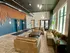 Modern apartment lobby with chic leather sofas, elegant lighting, and contemporary decor, exuding comfort and style.