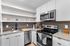 Kitchen with included furnishings