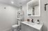 Furnished bathroom with shelving