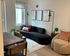 Living room with included furnishings such as couch, accent chair, and coffee table