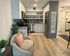 View of furnished kitchen and entryway from living room
