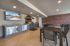 College Town, interior, common room, tables and chairs, food area, grill, sink, tv