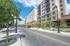 College Town, exterior, street, sidewalk, red brick and white buildings, cars, trees