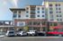 College Town, exterior, property main entrance, red brick and white, balconies, cars, street