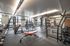 College Town, interior, fitness center, weights, large windows, elliptical, treadmills, pull up bars