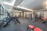 College Town, interior, fitness center, weights, benches, elliptical