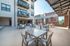 College Town, exterior, sky deck, out door seating, tables and chairs, balconies