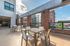 College Town, exterior, sky deck, out door seating, tables and chairs, balconies
