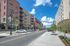 College Town, exterior, street, sidewalk, red brick and white buildings, cars