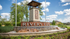 Inviting entrance sign for River's Edge community with a picturesque stone tower and flowing waterfall feature, surrounded by lush greenery.