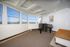Bright and airy music room with panoramic windows, featuring a sleek black grand piano and elegant minimalist decor.