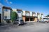 Charming apartment complex with classic architecture and ample parking space.