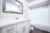 https://www.rutherfordliving.com/apartments/ca/walnut-creek/marquee/ - Modern Bathroom