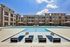 Resort Style Swimming Pool with BBQ grills