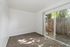 Aspen Apartments - Carpeted Room with Windows