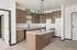 Modern kitchen featuring sleek wood cabinetry, elegant island with chic lighting, and contemporary design.