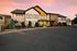 Clubhouse and Leasing Office Building Exterior at Sunset