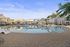 Resort-Style Pool with View of Community Buildings