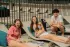 Residents Lounging at Pool Party