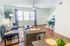 Bright and inviting living room with modern decor, hardwood floors, ample natural light, and cozy seating area for relaxation.