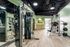 Modern fitness center with state-of-the-art equipment, bright lighting, and sleek design, perfect for an active lifestyle.