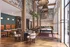 Elegant communal space with modern seating, stylish lighting, and a billiards table, perfect for social gatherings.