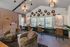 Chic lounge area with plush seating, contemporary lighting, and stylish wall art, perfect for relaxation and socializing.