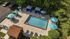 Pool at Bridgeview with umbrellas and seating