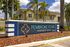 Pembroke Cove signage with palm trees