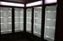 Sleek and spacious display fridge with bright LED lighting and multiple glass doors, perfect for showcasing chilled products.