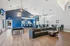 Chic recreation room with stylish pool table, cozy seating area, and sleek bar counter ideal for entertainment and relaxation.