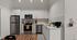 Modern kitchen with stainless steel appliances, sleek white cabinetry, and elegant hardwood flooring, perfect for culinary enthusiasts.