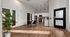 Modern apartment kitchen with sleek cabinetry, stainless steel appliances, and stylish dining area on elegant wood floors.