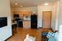 Kitchen and living room at vue campus apartments.